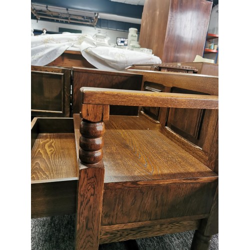 553 - Solid oak telephone table seat with drawer and cupboard in great condition with nice aged patina
109... 