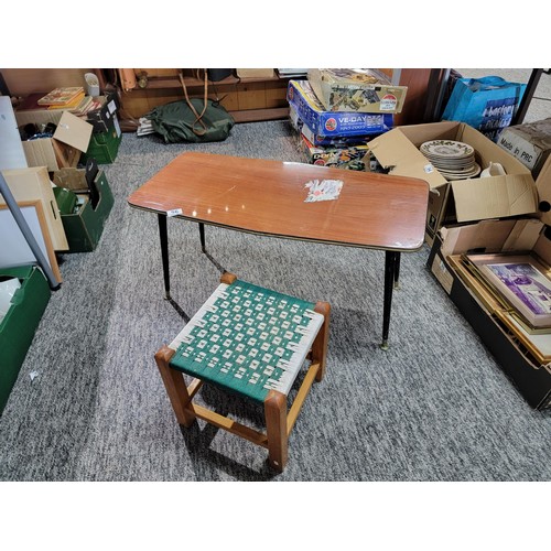 86 - A retro 1970's coffee table (sticker to the top needs removing), along with a small footstool. Has a... 