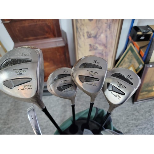 62 - Complete golf set with drivers and putter all matching by Mizuno except the putter along with some a... 