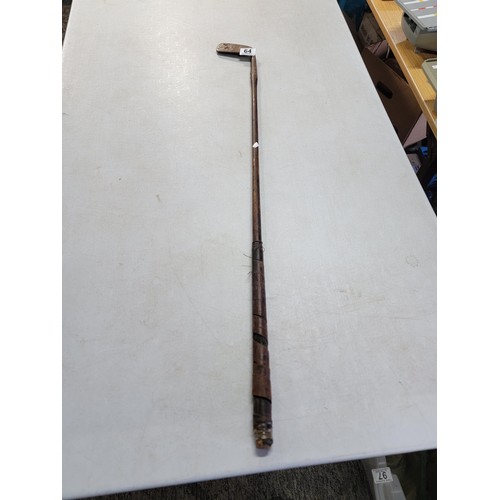 64 - Antique hickory shaft golf club signed by a pro, and marked R. Simpson Carnoustie in good overall co... 