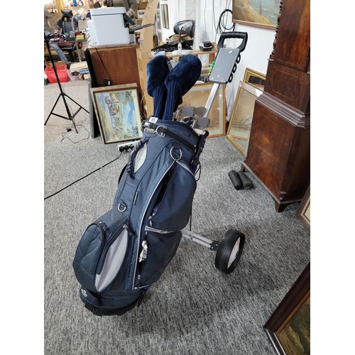 65 - Comprehensive unused as new golf club set with bag and trolley to include matching set by Williams G... 