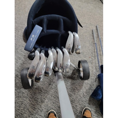 65 - Comprehensive unused as new golf club set with bag and trolley to include matching set by Williams G... 