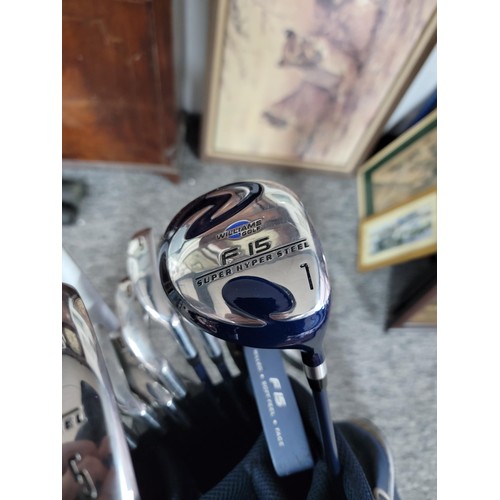 65 - Comprehensive unused as new golf club set with bag and trolley to include matching set by Williams G... 