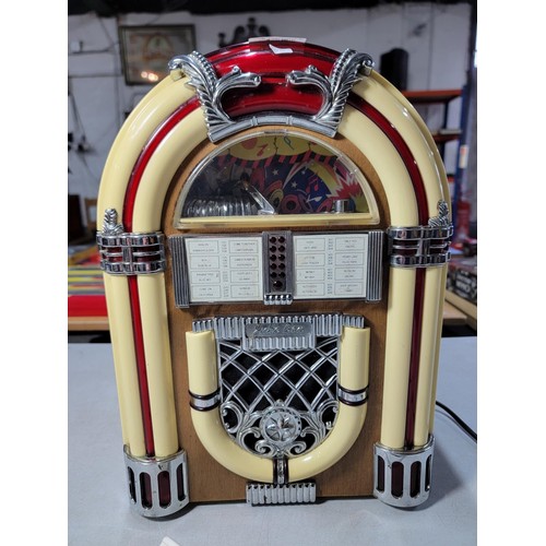 75 - Reproduction Jukebox radio and tape player in good working order