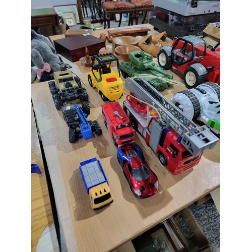 78 - Large quantity of various large scale model vehicals along with a large WWE John Cena figure 2018, s... 