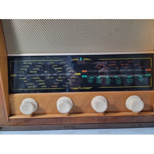 82 - Vintage radio by Bush Type A.C.34 in good overall condition, vendor stated that this is working howe... 