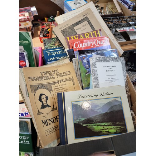 83 - A large quantity of various books along with ordinance survey maps, a Halls auction book, a Discover... 