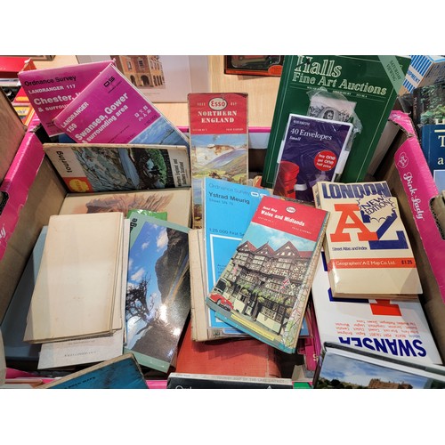 83 - A large quantity of various books along with ordinance survey maps, a Halls auction book, a Discover... 