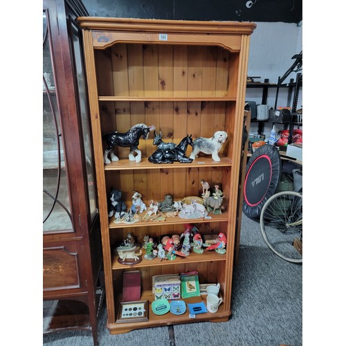 580 - A five division pine book shelf. with adjustable height shelves 181 cm high 87 cm wide 30cm deep