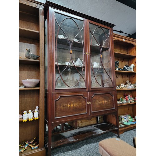 579 - Superb glazed display cabinet Edwardian mahogany with two glass doors and two doors to lower section... 