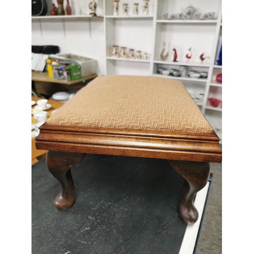 564 - A pair of upholstered stools with wooden cabriole legs. Both in the same fabric in good condition