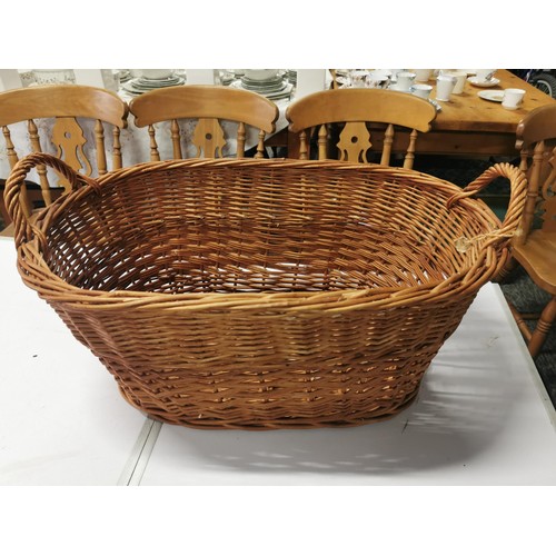 567 - A wicker log basket along with one other long basket