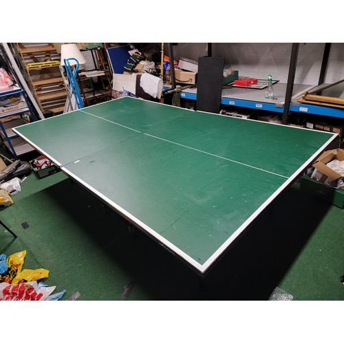 535 - Full size Table tennis table by Butterfly standing on castored trolley all complete no accessories i... 