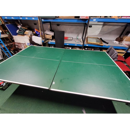 535 - Full size Table tennis table by Butterfly standing on castored trolley all complete no accessories i... 