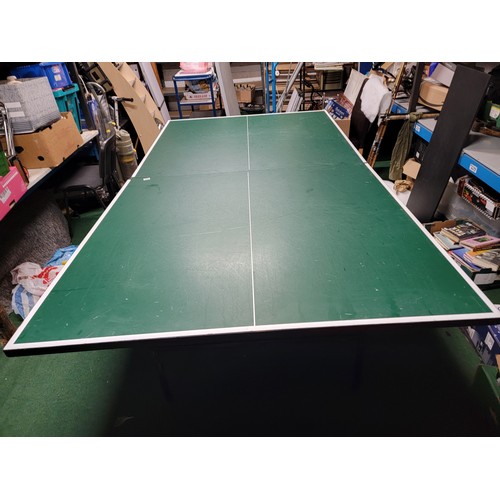 535 - Full size Table tennis table by Butterfly standing on castored trolley all complete no accessories i... 