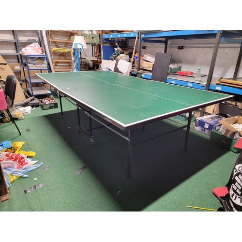 535 - Full size Table tennis table by Butterfly standing on castored trolley all complete no accessories i... 