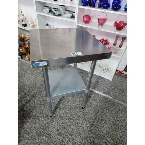 581 - Good quality stainless steel square catering table F.E.D. with a lower shelf in good clean condition... 