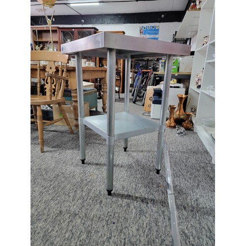 581 - Good quality stainless steel square catering table F.E.D. with a lower shelf in good clean condition... 