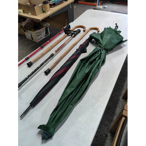 8 - 2x umbrellas inc a large green parasol umbrella, 2x wooden walking sticks 2x good quality walking po... 