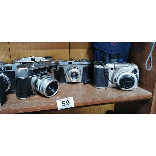 59 - A quantity of vintage cameras to include a Fujifilm digital camera, Halina, Minolta, and various Ita... 