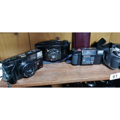 61 - A quantity of vintage film and digital cameras to include an Olympus Trip AF MD, an Olympus AZ-1 Zoo... 