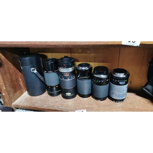 62 - A large quantity of camera lenses to include zoom and macro lenses, etc. Including Hanimex, Centon, ... 