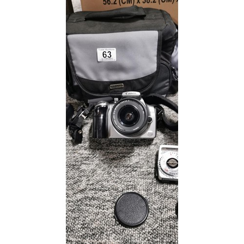 63 - A Canon EOS 300D digital SLR camera complete with bag and accessories and 2 lens.