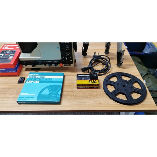 66 - A selection of camera accessories and a projector. Includes a Eumig S912GL Super 8 twin track projec... 