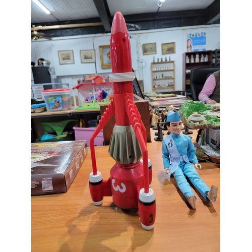 31 - Large collection of Thunderbirds related toys and games inc Thunderbird 2, a Thunderbird 1 rocket, 4... 