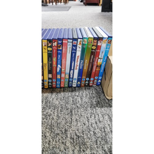 76 - A large quantity of Disney DVD's including a couple of limited editions, 1 being new and sealed. A n... 