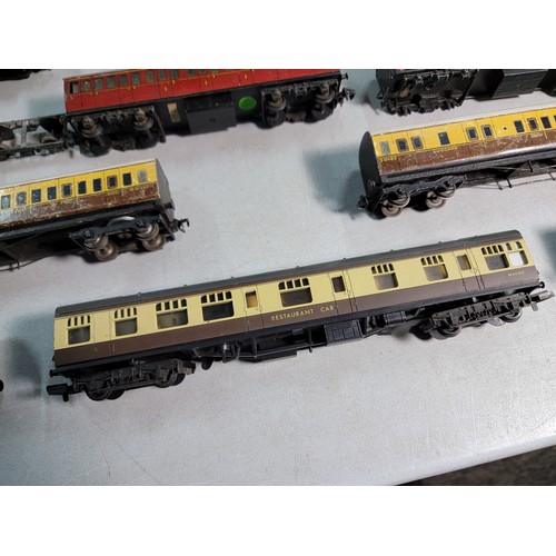 40 - Box contining a quantity of dummy locos and carriages made by Tri-ang, Lima, Hornby etc inc Pullman ... 