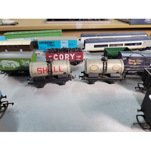 43 - Large quantity of rolling stock by Tri-ang and Hornby inc Shell rolling stock, Cory coal wagon, Pedi... 