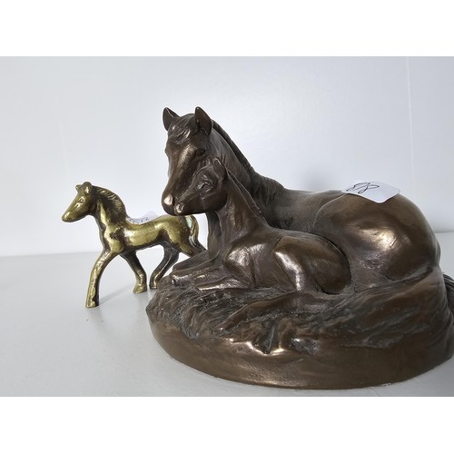 93 - A quantity of Horse figurines to include Horse and foal by the Leonardo collection resin figure a pa... 