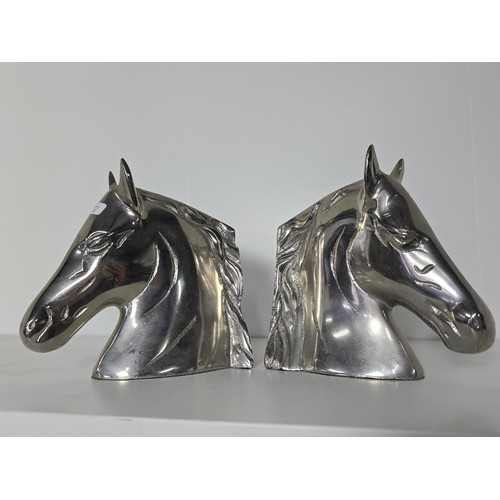 93 - A quantity of Horse figurines to include Horse and foal by the Leonardo collection resin figure a pa... 