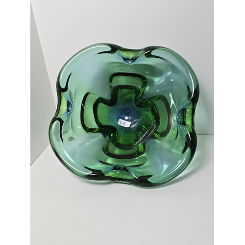 94 - A quantity of good quality studio art glass bowls along with a single vase, one of the bowls is in w... 