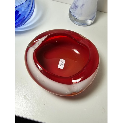 94 - A quantity of good quality studio art glass bowls along with a single vase, one of the bowls is in w... 