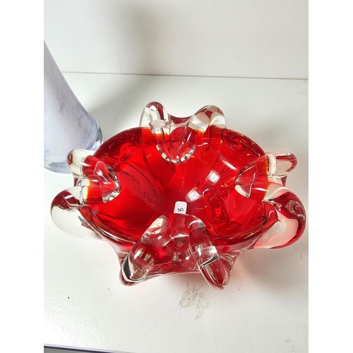 94 - A quantity of good quality studio art glass bowls along with a single vase, one of the bowls is in w... 