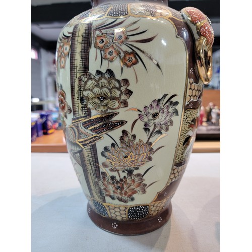 204 - 2x Antique Japanese satsuma vases, hand painted with a bird design and flower shaped handles, with g... 