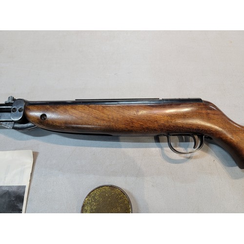 213 - Good quality Webley Mark III .22 air rifle with under barrel cocking mechanism complete with tin of ... 