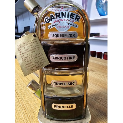 104 - A very rare vintage new and sealed Garnier liqueurs quadrille bottle stacking set from the 1950's wh... 