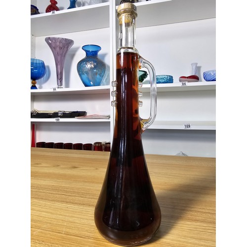 109 - A new and sealed vintage bottle of 500ml toffee liqueur dream in a trumpet formed bottle in tribute ... 