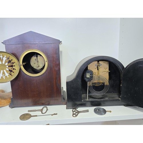 107 - 2x good vintage mantel clocks along with a pair of vintage shoe shapers and historical headlines new... 