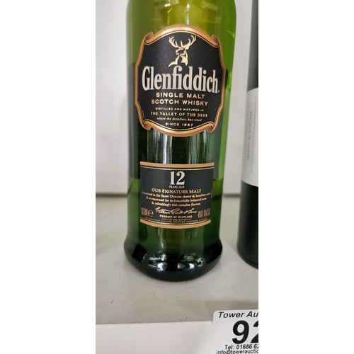 92 - 2 bottles of Glenfiddich Scotch. Includes a new and sealed bottle of 50cl Glenfiddich 