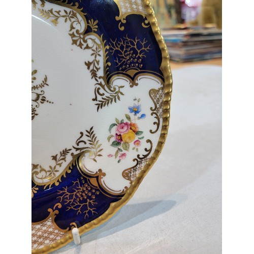 214 - 2x good quality gilt rimmed hand painted Coalport plates in good order with no chips or cracks along... 