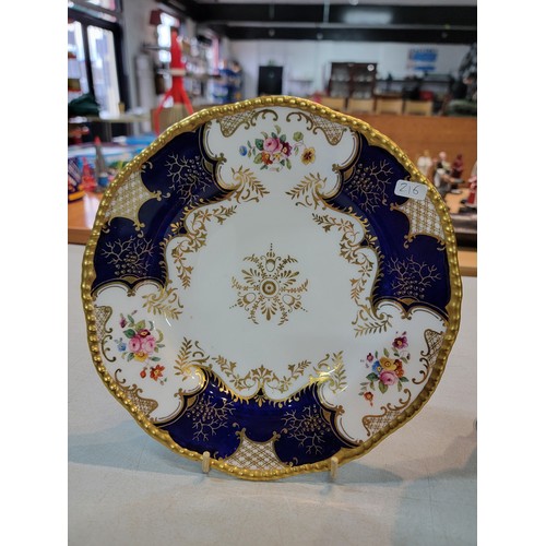 214 - 2x good quality gilt rimmed hand painted Coalport plates in good order with no chips or cracks along... 