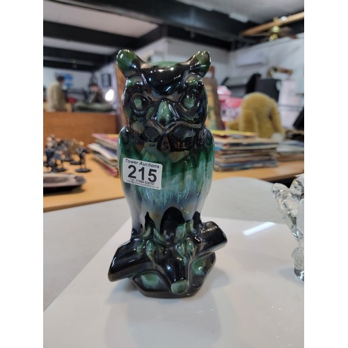 215 - A blue mountain owl figure in good order along with a  glass squirrel in good order owl stands at 25... 