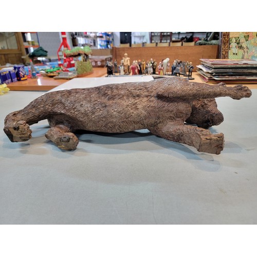 220 - Good quality solid wooden hand carved figure of a Puma / Mountain Lion, well executed, has a small s... 