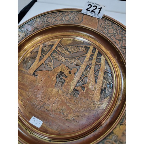 221 - Vintage metal dish with bronze effect depicting a hunting boar scene to the centre with horse relate... 