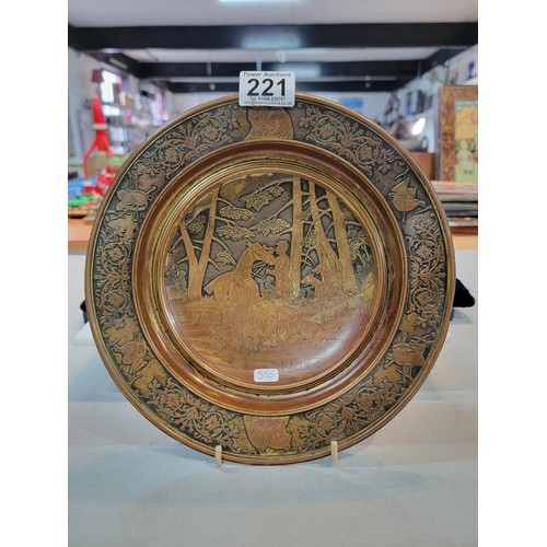 221 - Vintage metal dish with bronze effect depicting a hunting boar scene to the centre with horse relate... 