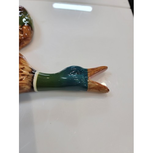 222 - Beswick wall hanging flying mallard, stamped 596-2, with a good glaze with no chips or cracks, heigh... 